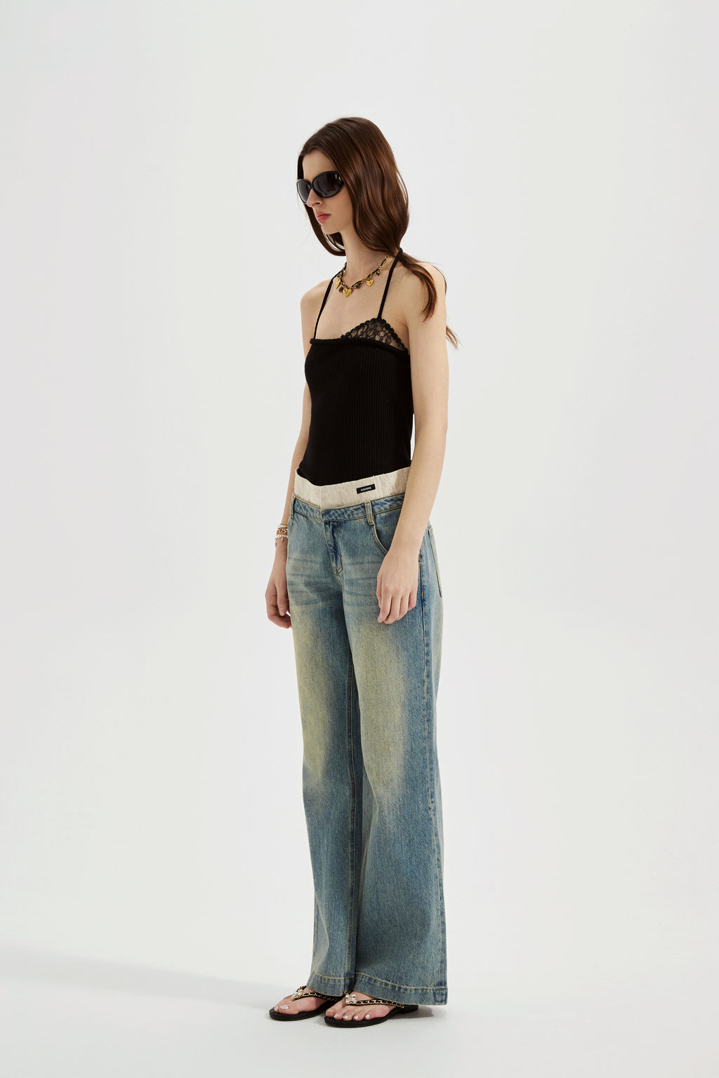 Black halterneck knit top with lace panels