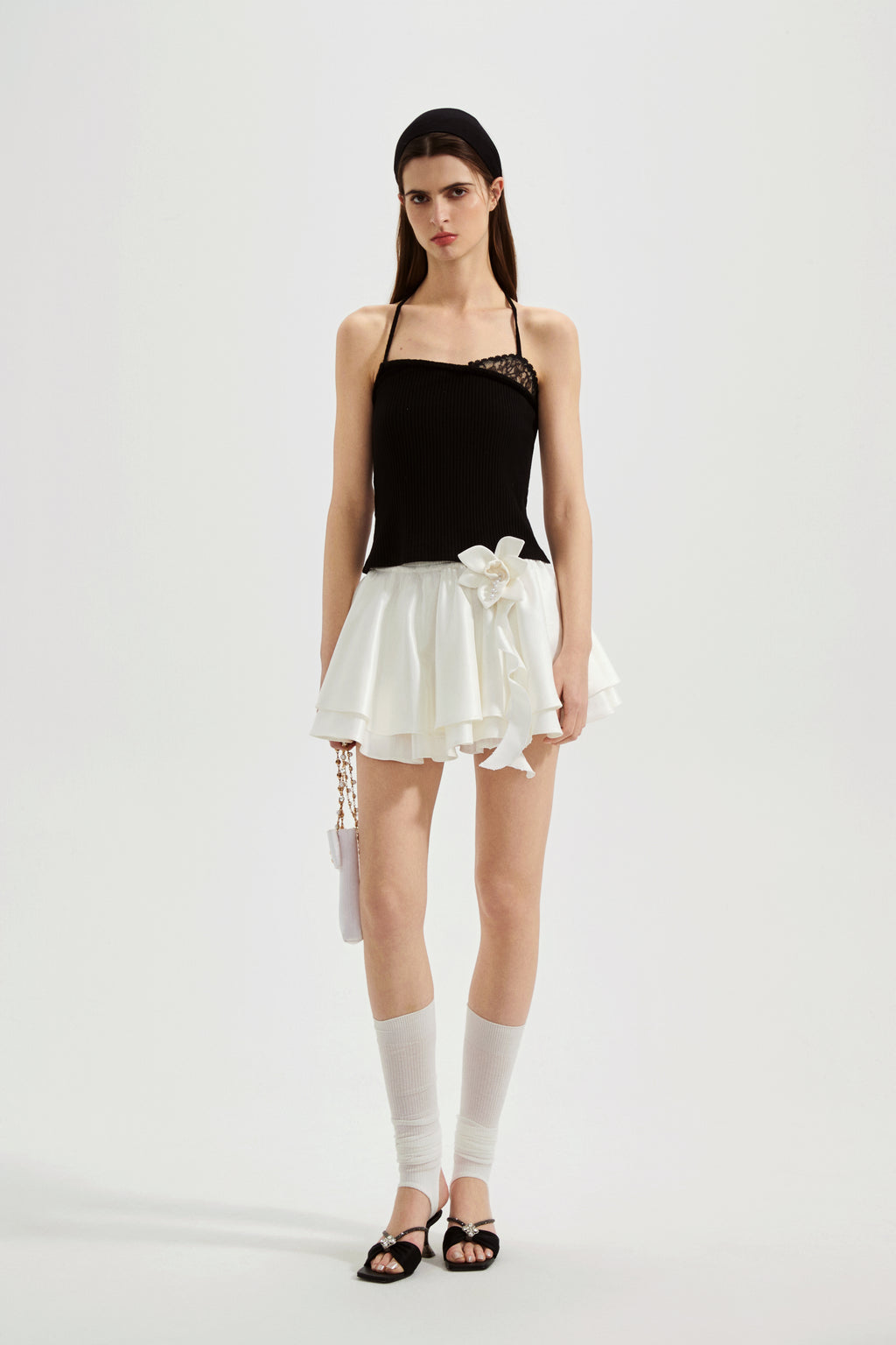 Black halterneck knit top with lace panels