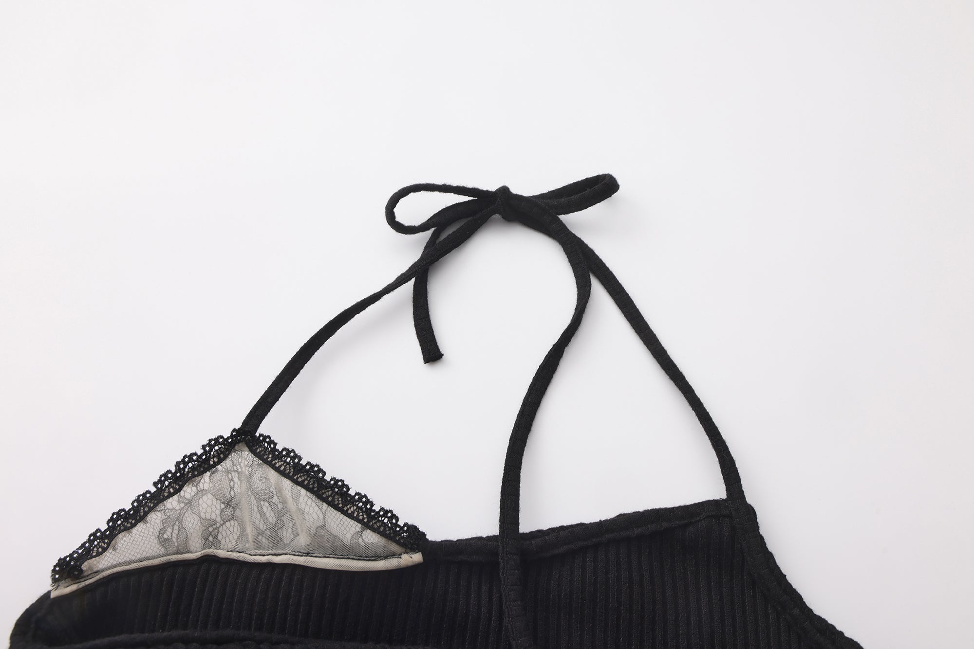 Black halterneck knit top with lace panels