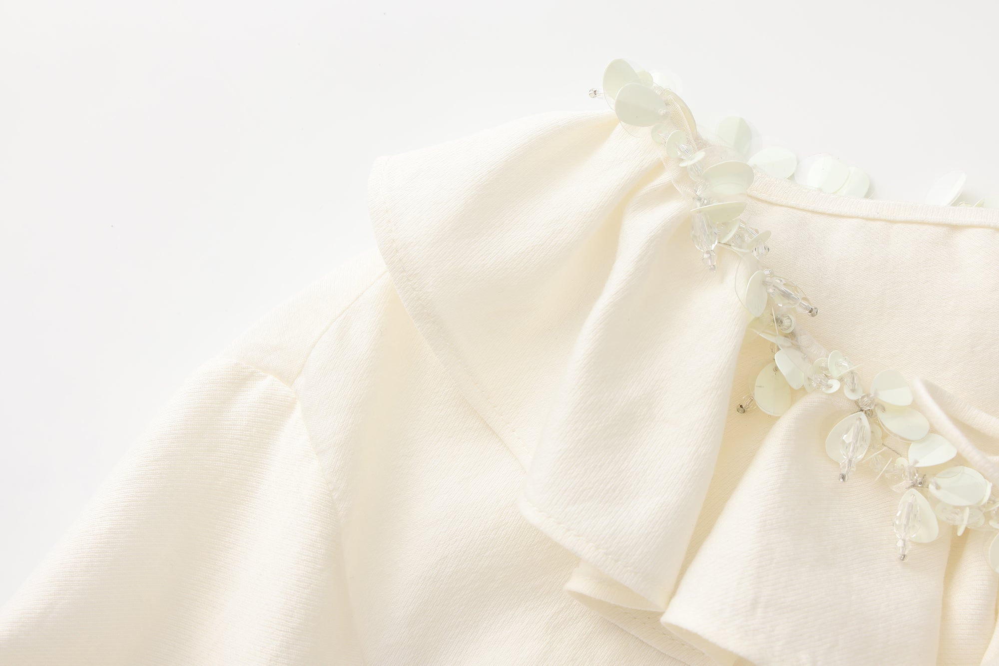 Oversized V-Neck Tie Top with Sequin Ruffle Trim