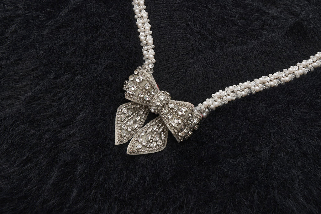 Black Bow Draped Chain Sweater